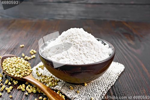 Image of Flour buckwheat green in bowl on dark board