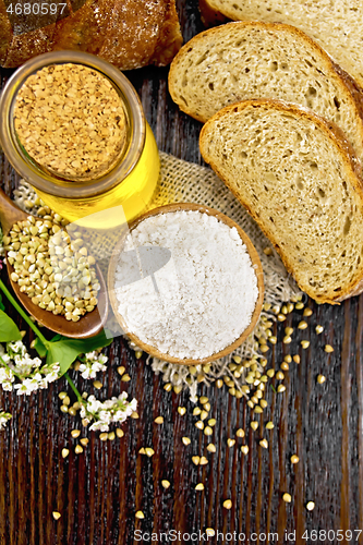 Image of Flour buckwheat green in bowl with bread on board top