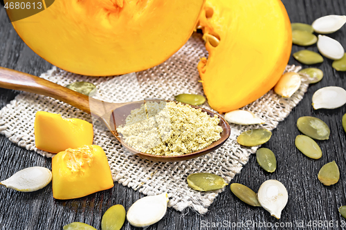 Image of Flour pumpkin in spoon on board