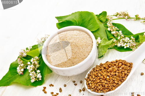 Image of Flour buckwheat brown in bowl on board