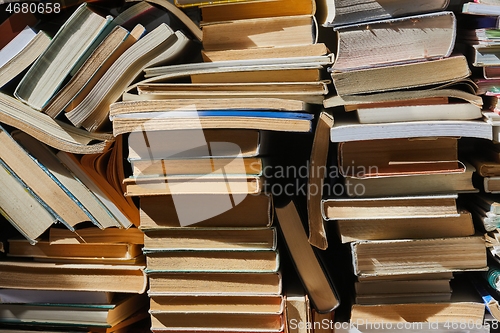 Image of Wall of books piled up