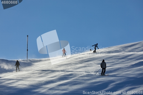 Image of Skiing slopes with skiers