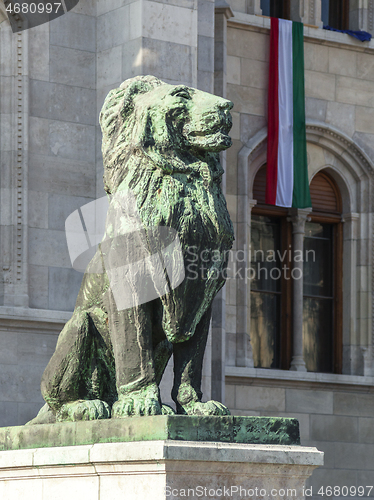 Image of Lion Statue in front of the Budapest Parliament