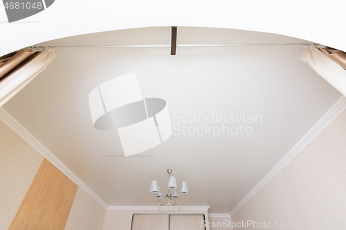 Image of Classic white matte ceiling in the bedroom