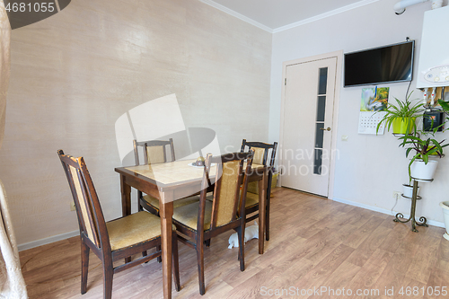 Image of Dining table in the interior of a small kitchen