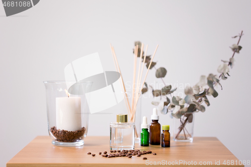 Image of aroma reed diffuser, candle and essential oil
