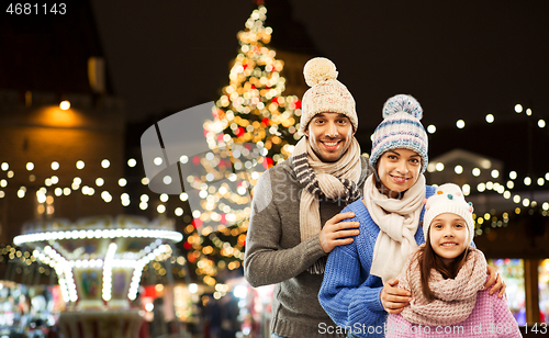 Image of happy family over christmas market in tallinn