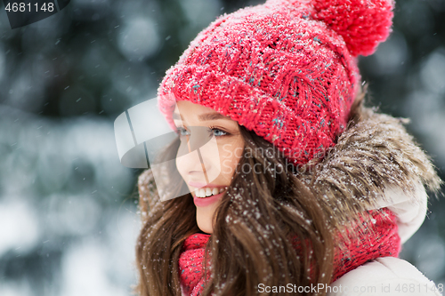 Image of smiling teenage girl outdoors in winter