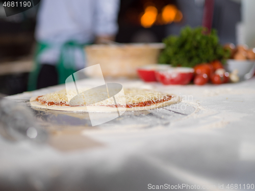 Image of raw pizza margarita