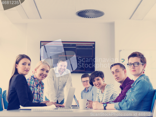 Image of Business Team At A Meeting at modern office building