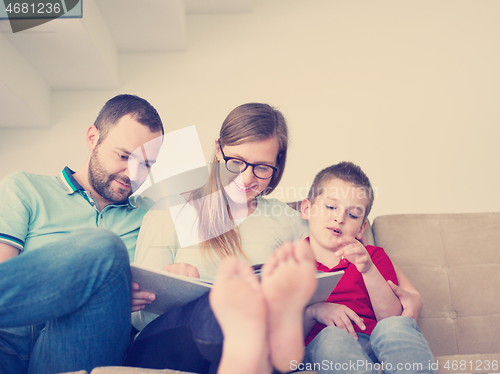 Image of family with little boy enjoys in the modern living room