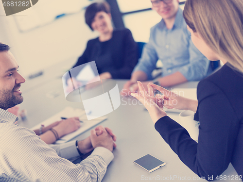 Image of Business Team At A Meeting at modern office building