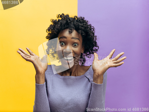 Image of Winning success woman happy ecstatic celebrating being a winner. Dynamic energetic image of female afro model