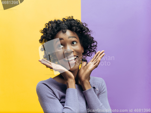 Image of Winning success woman happy ecstatic celebrating being a winner. Dynamic energetic image of female afro model