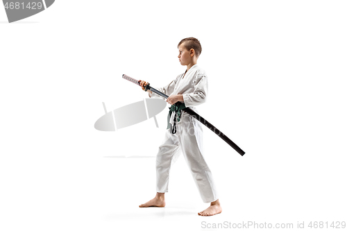 Image of Teen boy fighting at aikido training in martial arts school