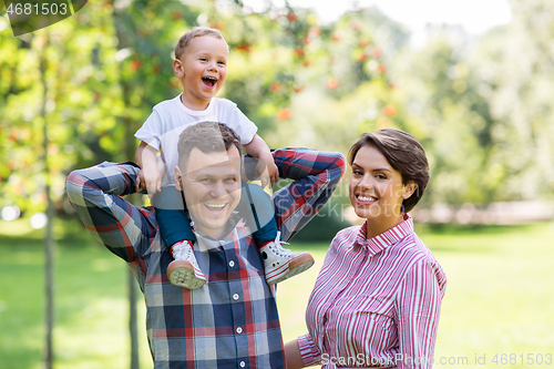 Image of happy family having fun at summer park