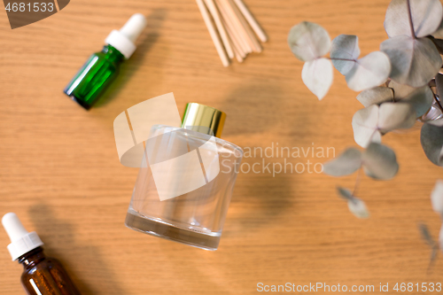 Image of aroma reed diffuser, essential oil and eucalyptus