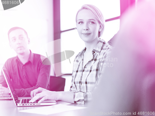 Image of Business Team At A Meeting at modern office building