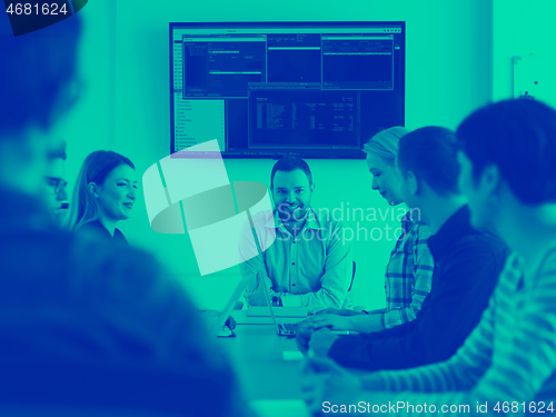 Image of Business Team At A Meeting at modern office building