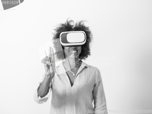 Image of black girl using VR headset glasses of virtual reality