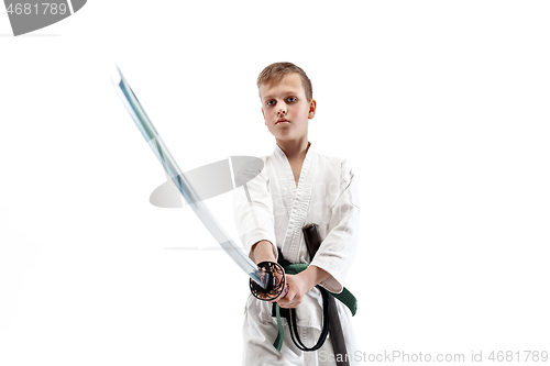Image of Teen boy fighting at aikido training in martial arts school