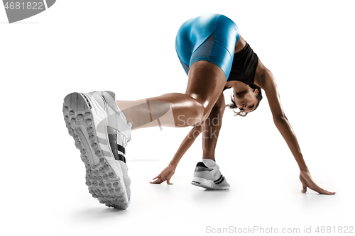 Image of Young african woman running or jogging isolated on white studio background.