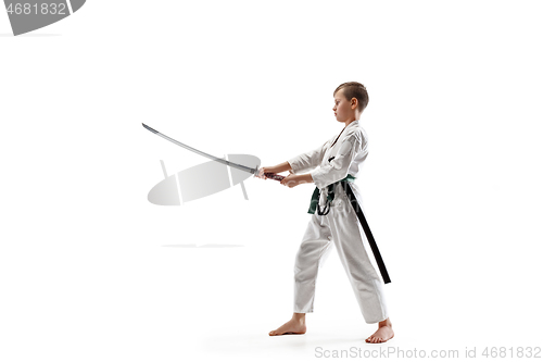 Image of Teen boy fighting at aikido training in martial arts school