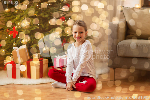 Image of smiling girl at christmas home