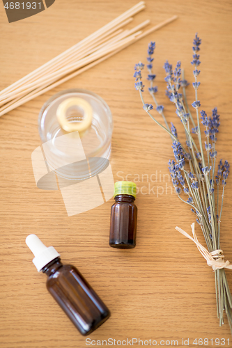 Image of aroma reed diffuser, essential oil and lavender