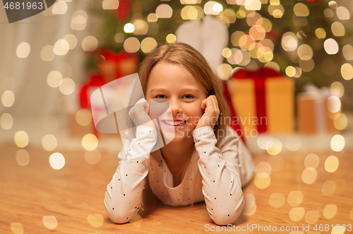 Image of smiling girl at christmas home