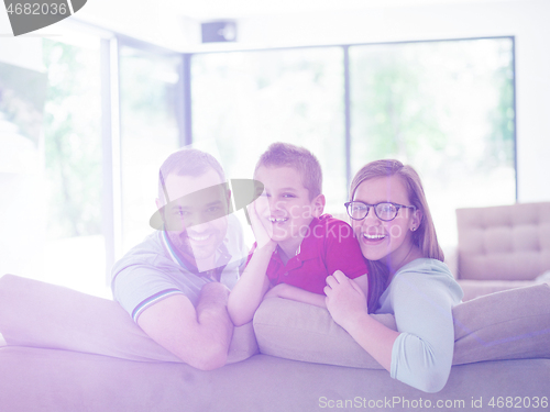 Image of family with little boy enjoys in the modern living room