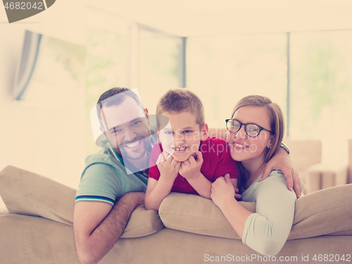 Image of family with little boy enjoys in the modern living room