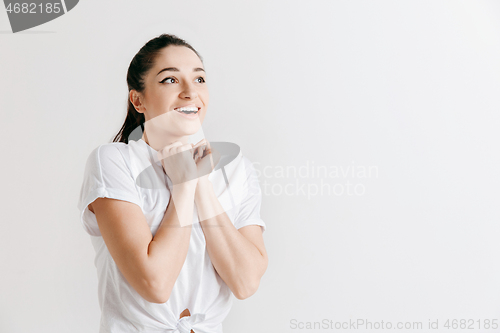 Image of Beautiful woman looking suprised