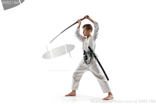 Image of Teen boy fighting at aikido training in martial arts school