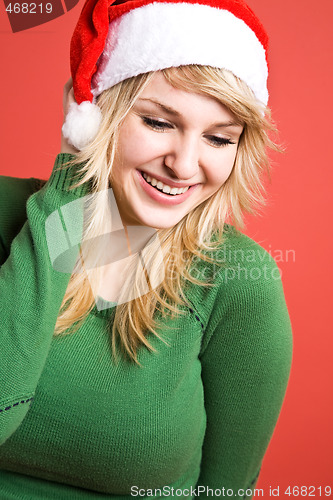 Image of Caucasian girl wearing santa hat