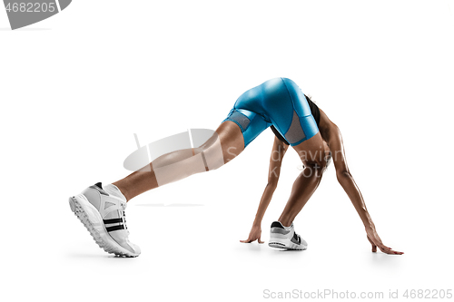 Image of Young african woman running or jogging isolated on white studio background.