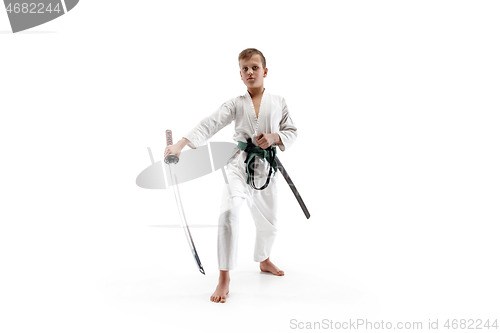 Image of Teen boy fighting at aikido training in martial arts school