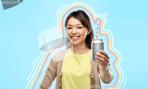 Image of happy asian woman with can drink