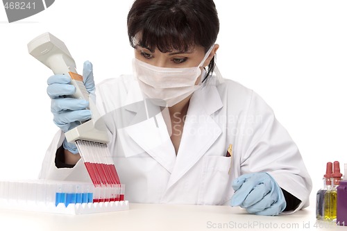 Image of female scientist working in lab