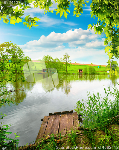 Image of Wooden pier and calm river