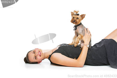 Image of Girl with yorkie dog