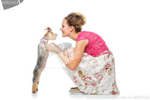 Image of Girl with yorkie dog