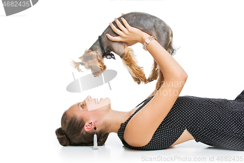 Image of Girl with yorkie dog