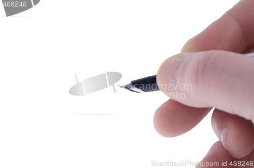 Image of hand with pen