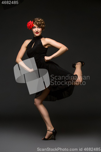 Image of girl dancer in tango dress