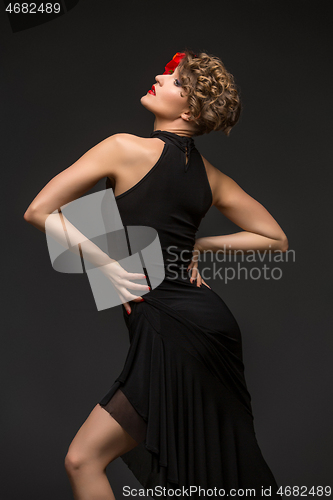 Image of girl dancer in tango dress