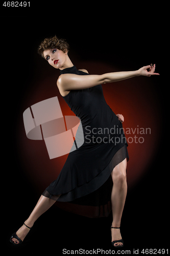 Image of girl dancer in tango dress