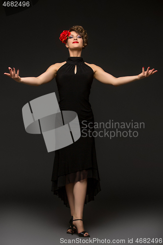 Image of girl dancer in tango dress