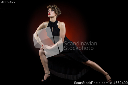 Image of girl dancer in tango dress