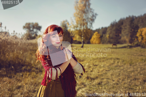 Image of Beautiful girl outdoors in countryside